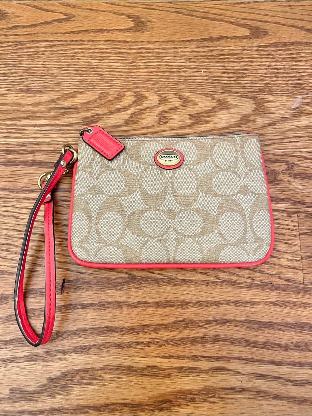 Coach Signature Canvas Wristlet with Coral Trim and Gold Hardware